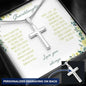 Personalized Cross Necklace with a polished stainless-steel cross and a to granddaughter greeting card in a two-tone box angled slightly right
