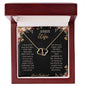A 10k gold Everlasting Love Necklace in a mahogany box with a to wife greeting card