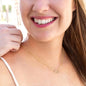 everlasting love necklace on model's front right side