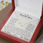 a everlasting love necklace in a mahogany box up close angled right
