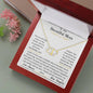 a everlasting love necklace in a mahogany box angled right