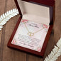 Everlasting Love Necklace on a woodgrain table