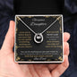 Lucky In Love Necklace with a white gold charm in a two-tone box angle 3