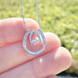 lucky in love necklace in model's hand
