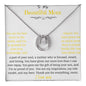 A lucky in love necklace in a two-tone box