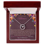 lucky in love necklace in mahogany box