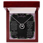 Lucky In Love Necklace with a white gold charm with a to granddaughter from grandma greeting card in a mahogany box