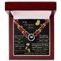 white gold lucky in love necklace in a mahogany box