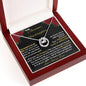 white gold lucky in love necklace in mahogany box angled left