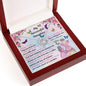 white gold lucky in love necklace in mahogany box angled left