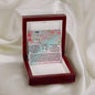 white gold lucky in love necklace in mahogany box on white cloth