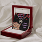 lucky in love necklace in a mahogany box with LED light on