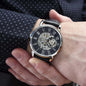 openwork watch on a model's wrist