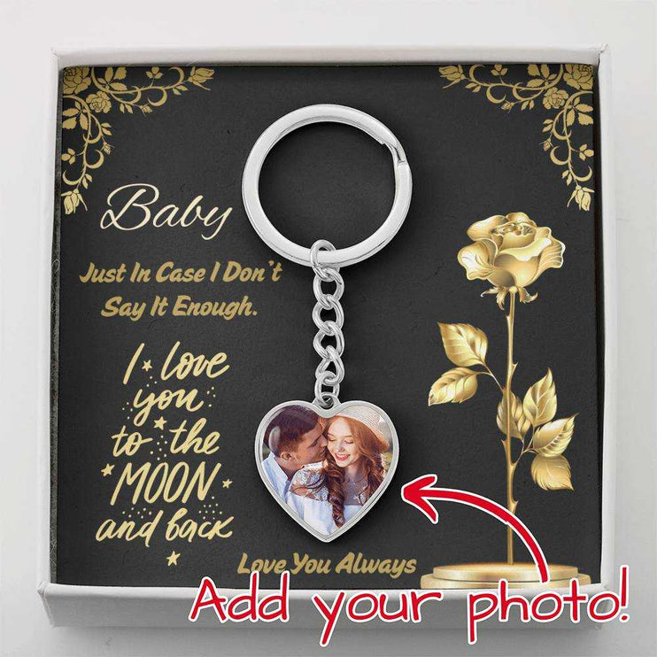 stainless-steel photo heart keychain in soft box up close