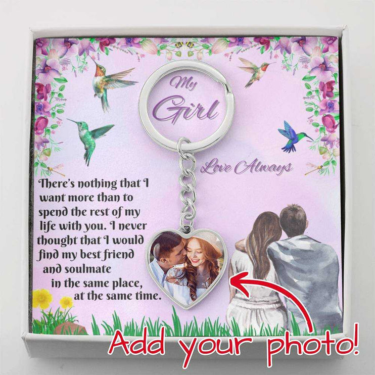 stainless-steel photo heart keychain in soft box up close