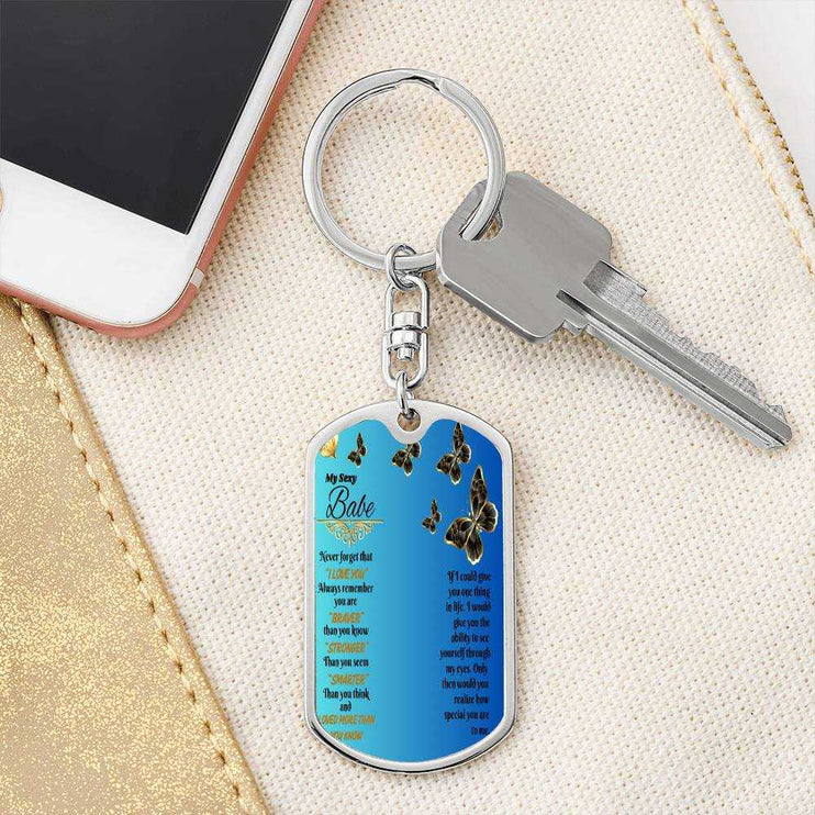 stainless-steel photo dog tag keychain on a key