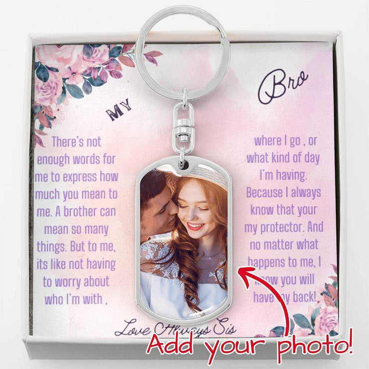  A polished stainless-steel Photo Upload Dog Tag Swivel Keychain in a two-tone box up close