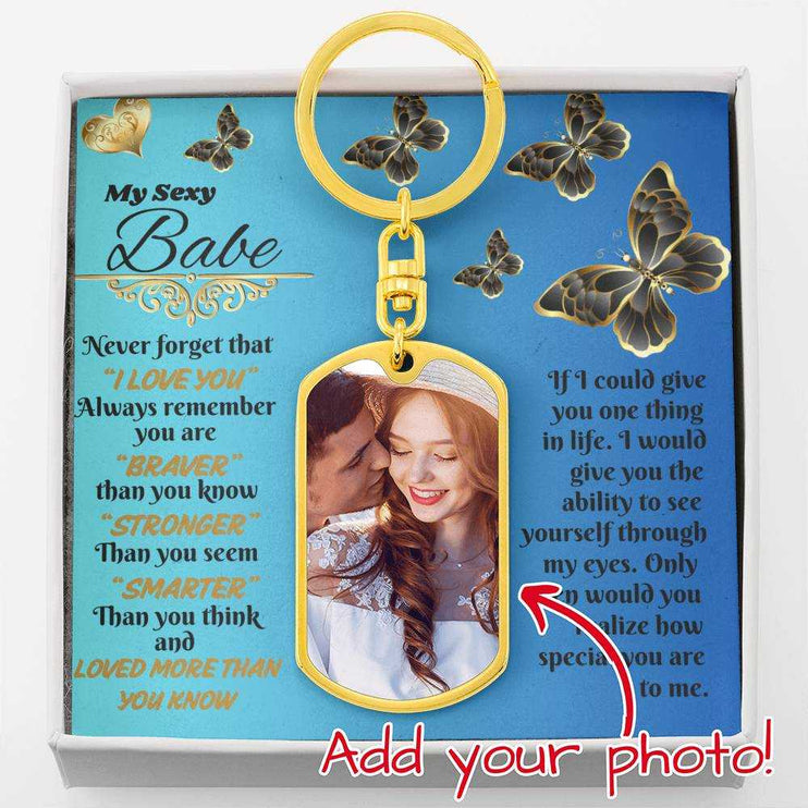 18k gold photo dog tag keychain in soft box up close