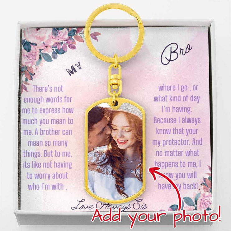  A yellow gold finish Photo Upload Dog Tag Swivel Keychain in a two-tone box up close