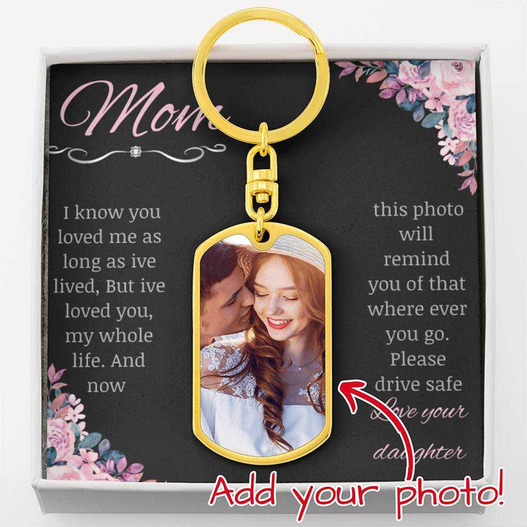 A yellow gold finish photo upload dog tag swivel keychain in a two-tone box up close 