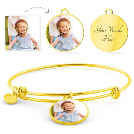 a yellow gold photo circle pendant bangle showing picture option.