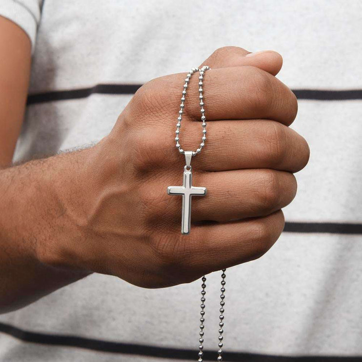 personalized cross in model's hand