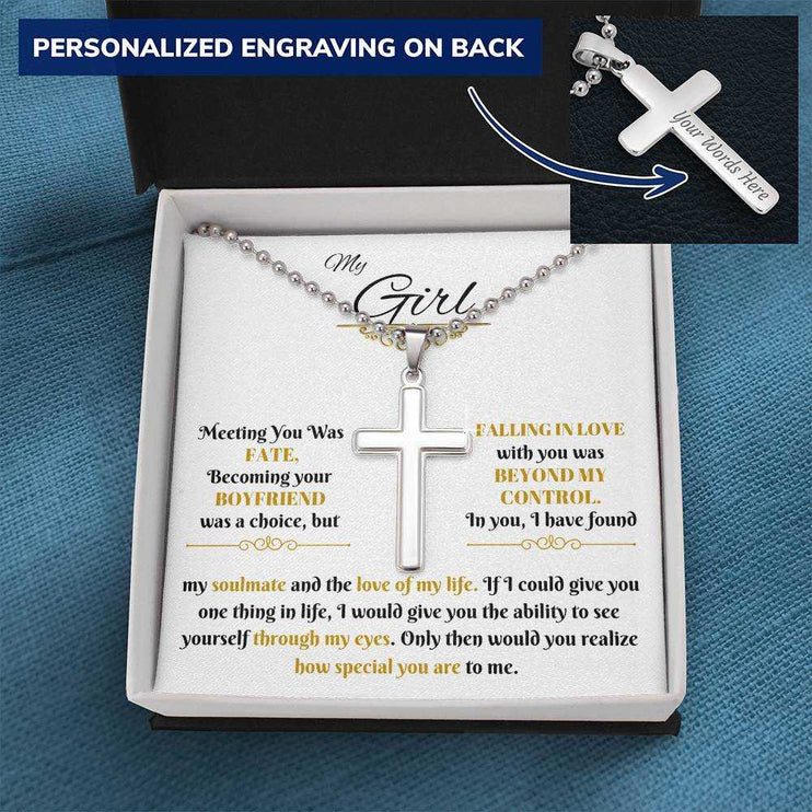 personalized cross on snake chain in soft box on blue cloth