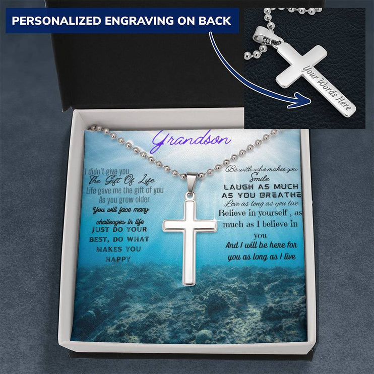 a personalized cross ball chain necklace up close in a two-tone box showing engraving option
