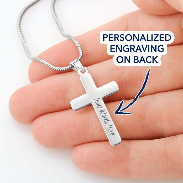 Personalized Cross on Snake Chain in a model's hands with engraving