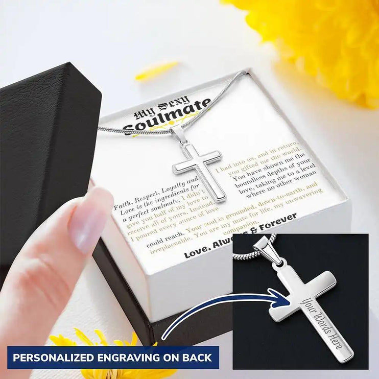 a personalized cross necklace in a two-tone box with yellow flower