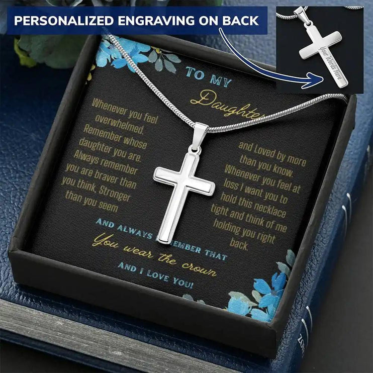 a personalized cross necklace up close angled right.