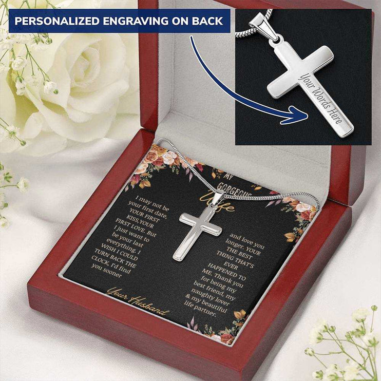 A personalized cross necklace on a to gorgeous wife greeting card in a mahogany box on a white cloth angled to the right with a white rose.