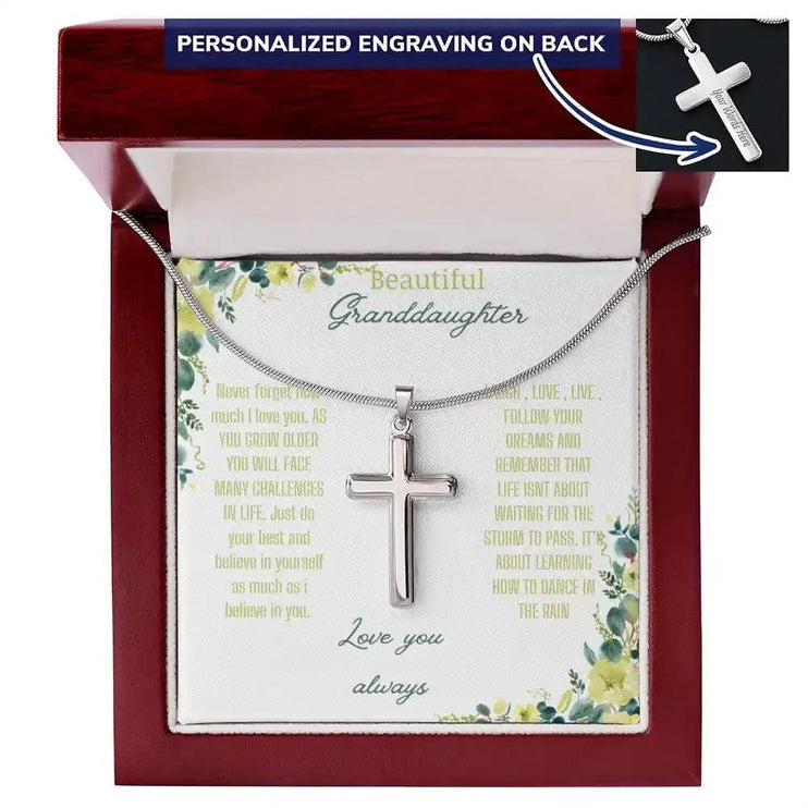 Personalized Cross Necklace with a polished stainless-steel cross and a to granddaughter greeting card in a mahogany box with a white background