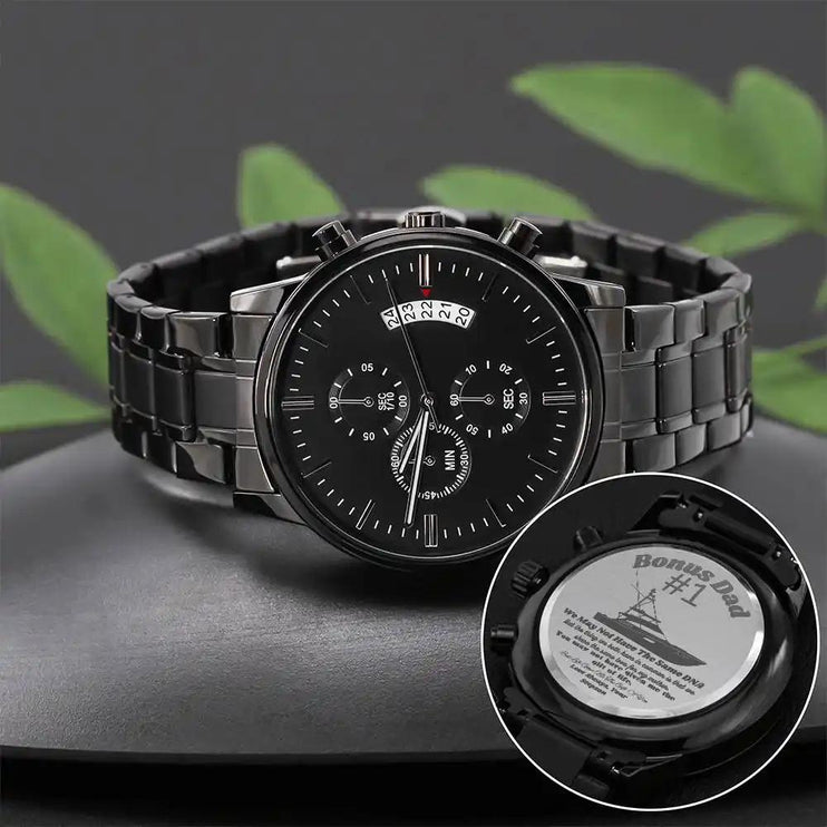 Engraved Chronograph Watch on a grey watch.