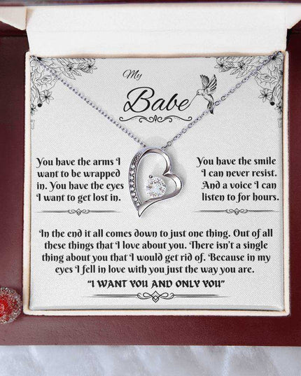 white gold forever love necklace in a luxury box up close