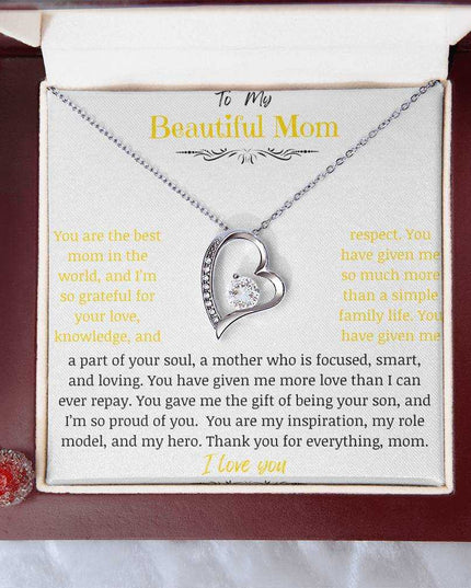 A white gold forever love necklace in a mahogany box