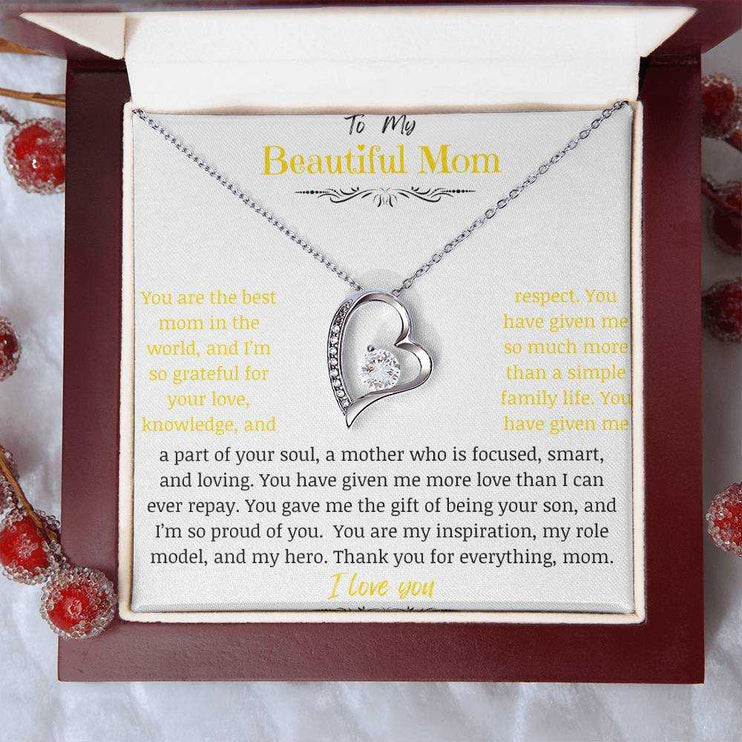 A white gold forever love necklace in a mahogany box