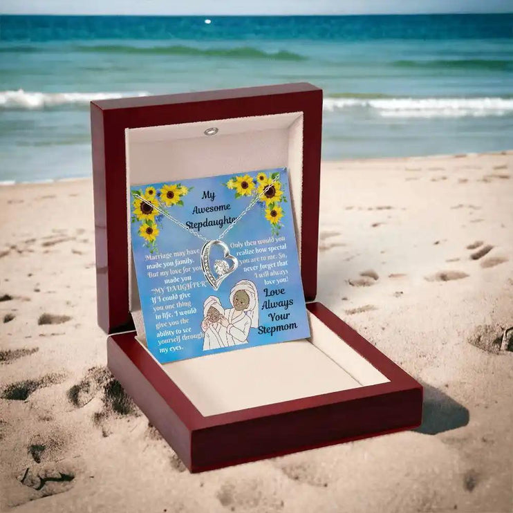 Forever Love Necklace yellow gold mahogany box on beach