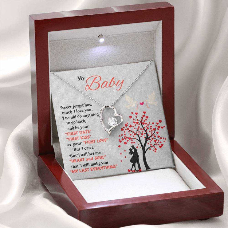 white gold forever love necklace in a luxury box with LED light on