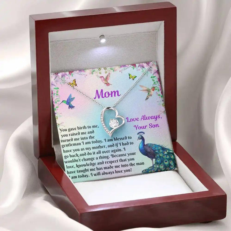 white gold forever love necklace in mahogany box angled left