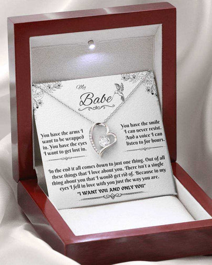 white gold forever love necklace in a luxury box with LED light on