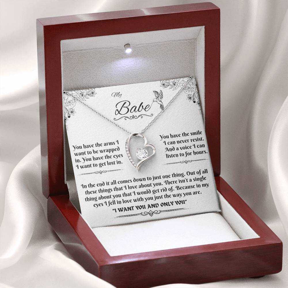 white gold forever love necklace in a luxury box with LED light on