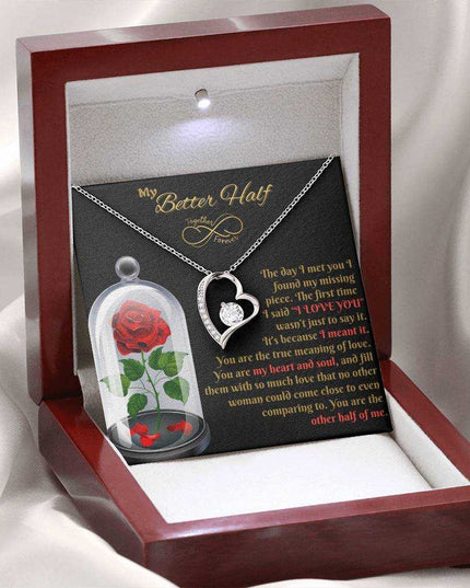 white gold forever love necklace in a luxury box angled left