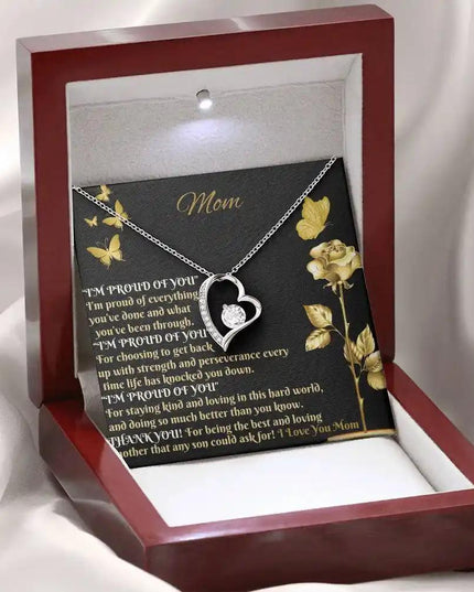 white gold forever love necklace in mahogany box angled left