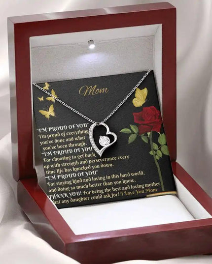 white gold forever love necklace in mahogany box angled left