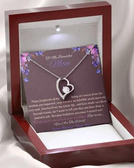 white gold forever love necklace in mahogany box angled left