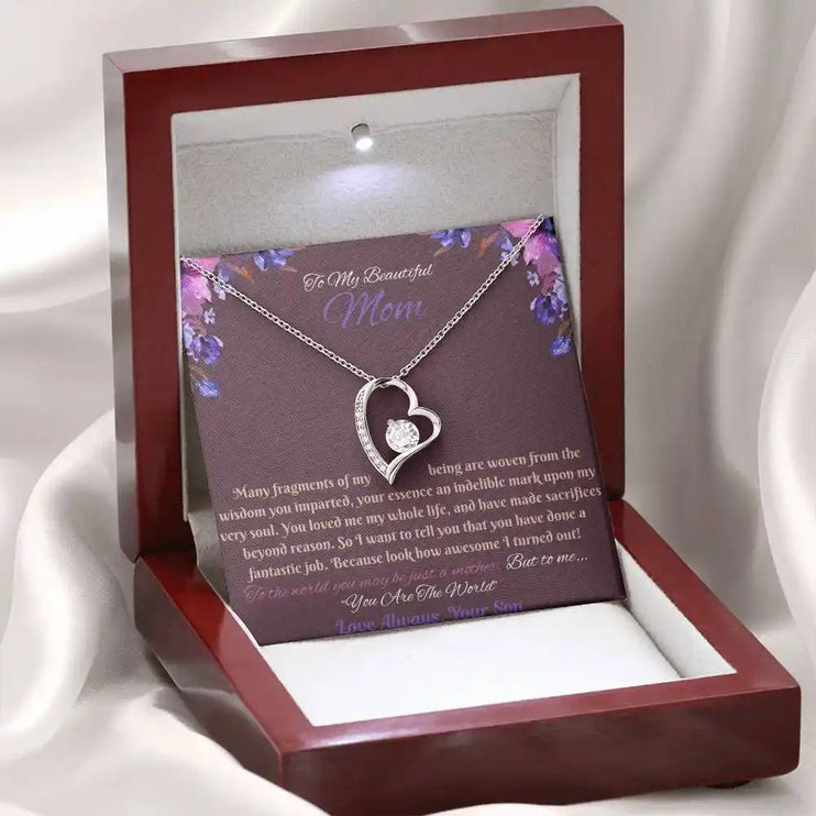 white gold forever love necklace in mahogany box angled left