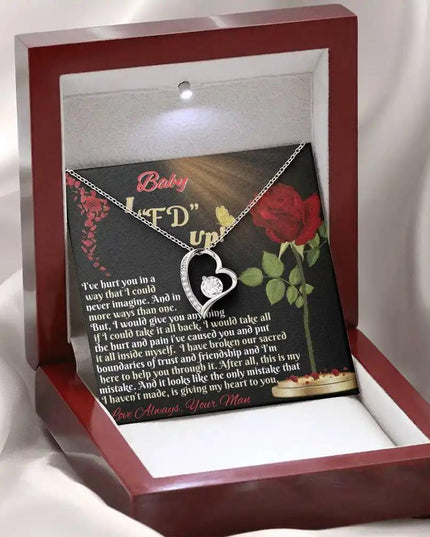 white gold forever love necklace in mahogany box angled left