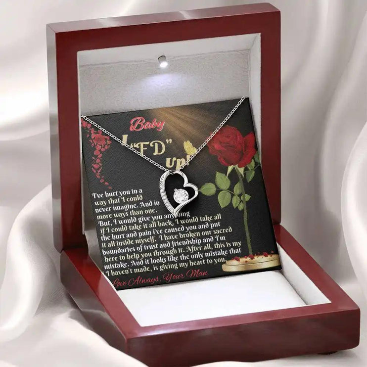 white gold forever love necklace in mahogany box angled left