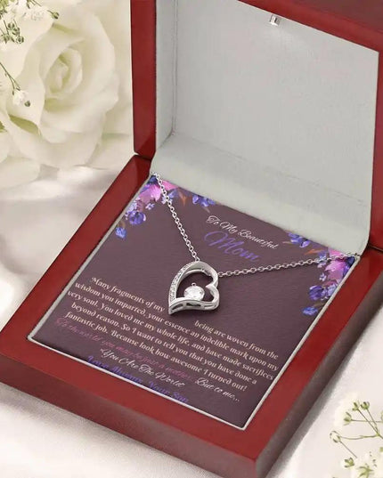 white gold forever love necklace in mahogany box angled right